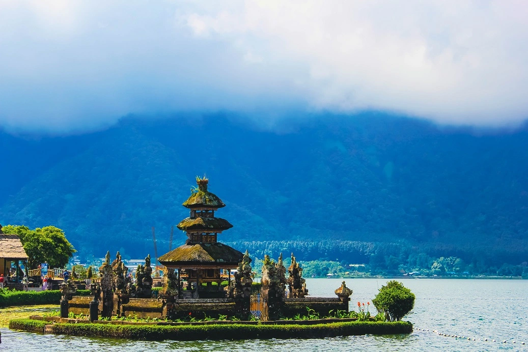 A serene temple situated in the heart of a tranquil lake in Bedugul Charter Car - Kura-Kura Bus