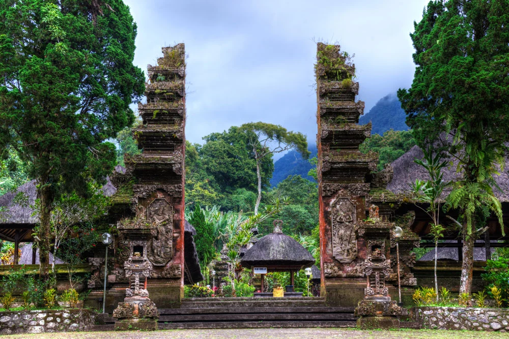 Batukaru Temple surrounded by rainforest and mountain scenery in Bali