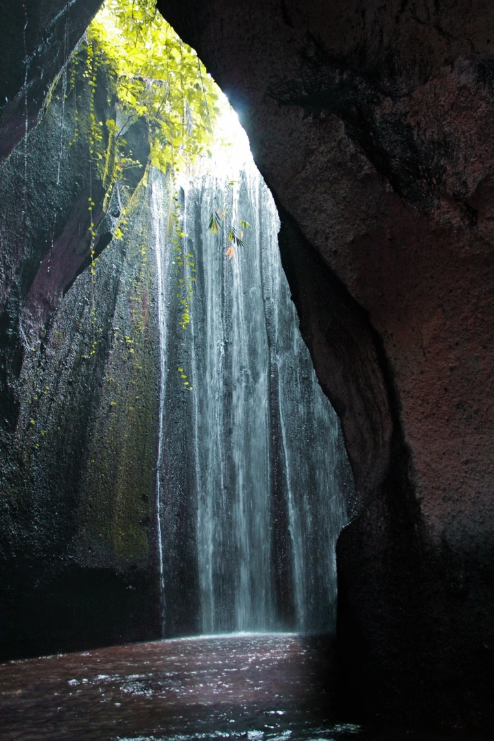 Hidden and magical, Tukad Cepung Waterfall. Charter Car - Kura-Kura Bus